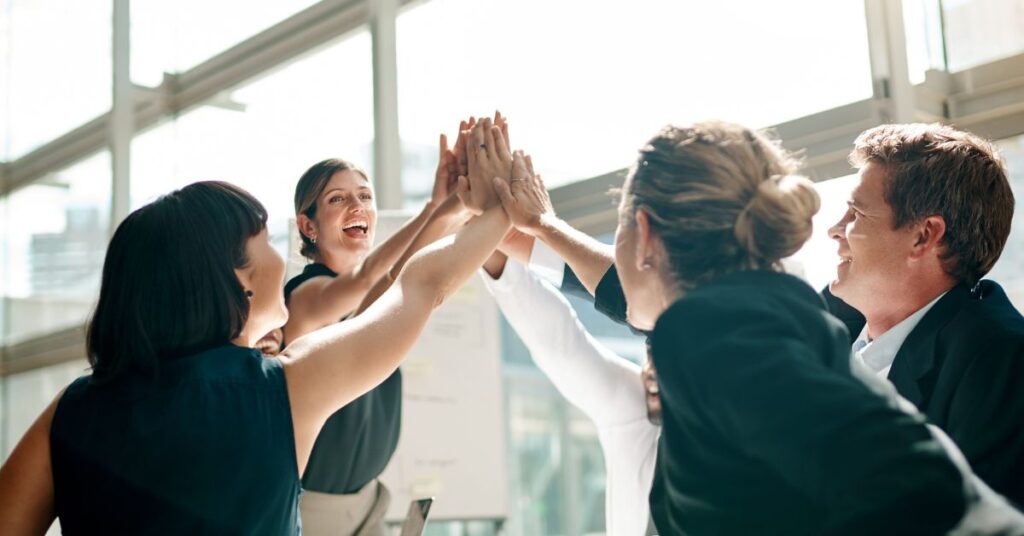 US expats high five.